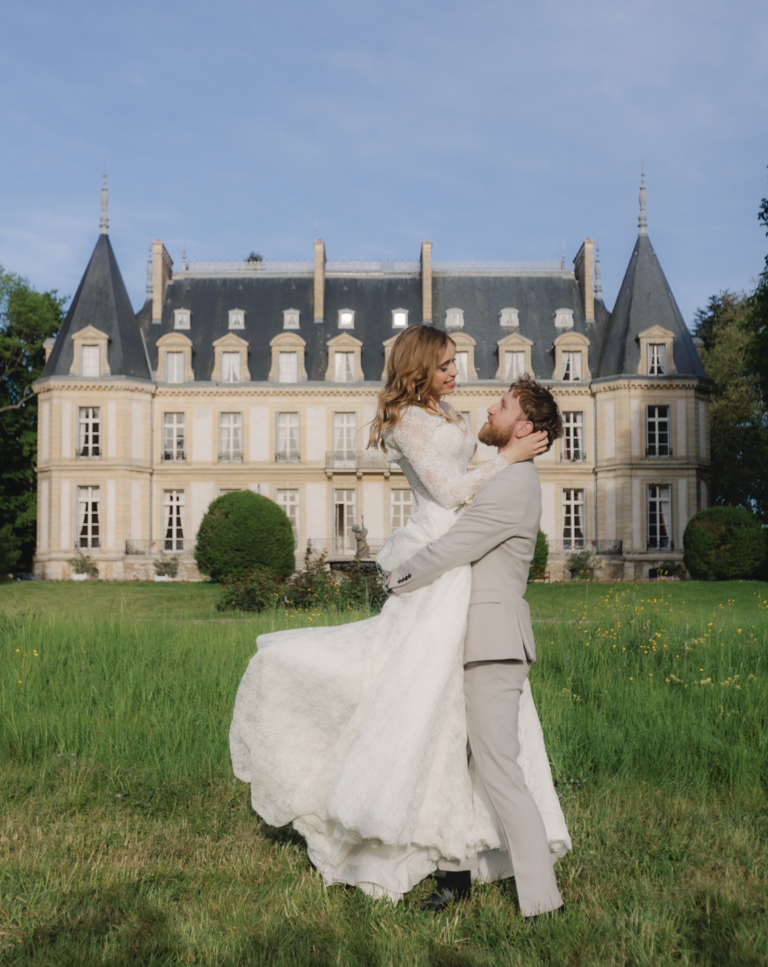 couple in front of chateau